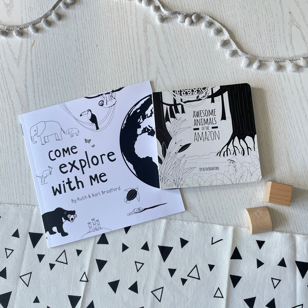 A gift set with Come Explore With Me story book and Awesome Animals of the Amazon sensory board book in black and white by Ruth Bradford