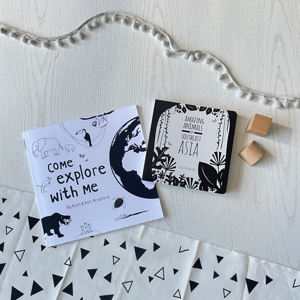 A gift set with Come Explore With Me story book and Amazing Animals of Southeast Asia sensory board book in black and white by Ruth Bradford